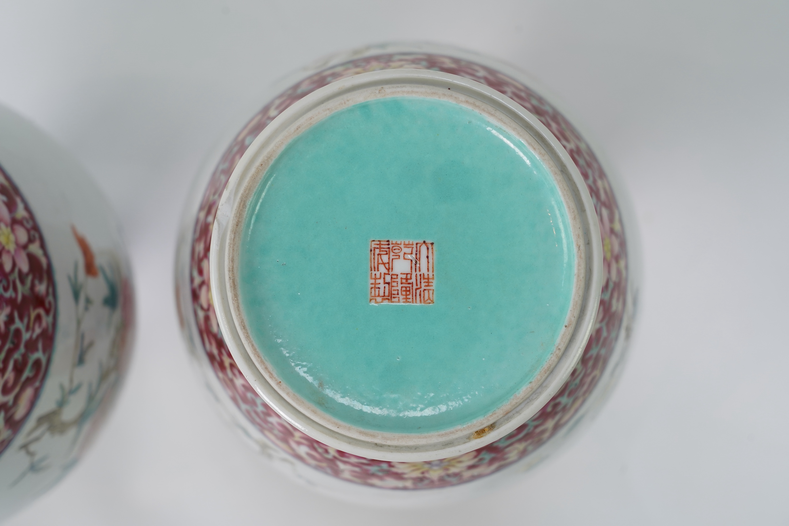 A pair of Chinese famille rose ‘sanduo’ vases, Qianlong seal mark, 19th century
